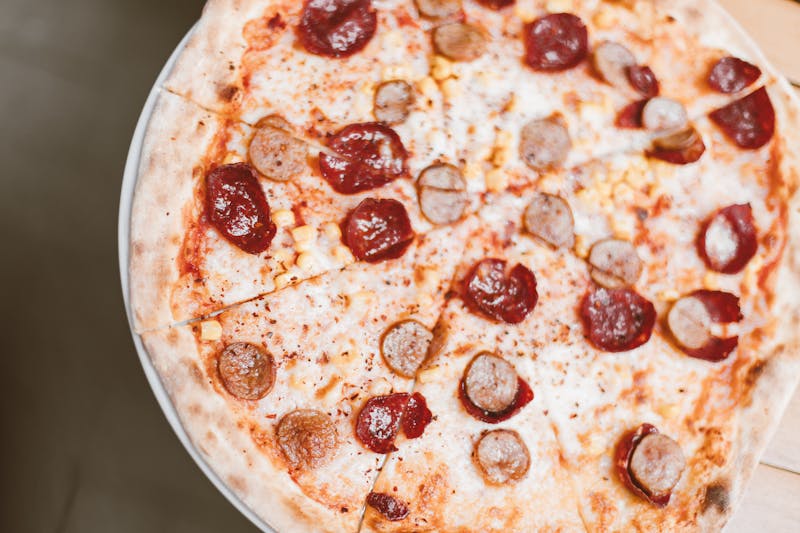 Supreme loaded pizza with meats and vegetables at Pizza Ranch
