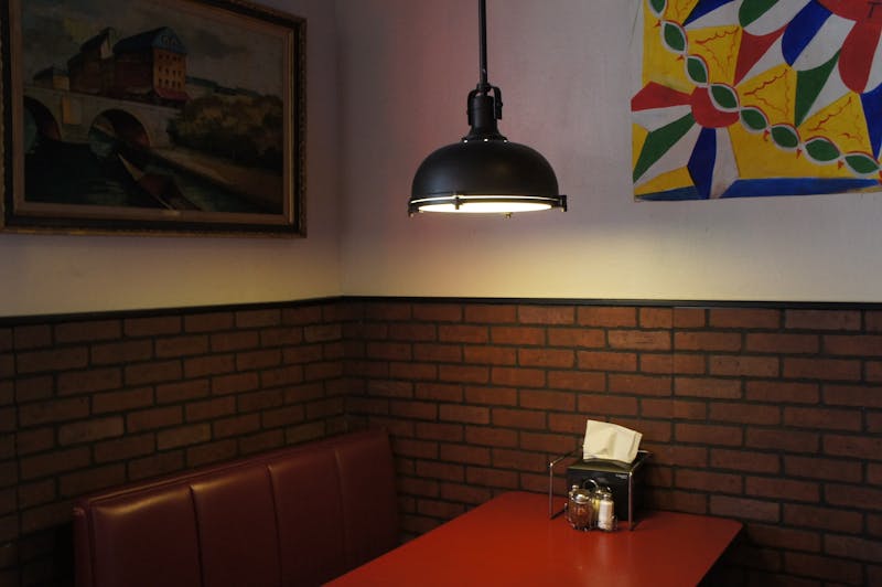 Cozy corner seating area inside Pizza Ranch restaurant