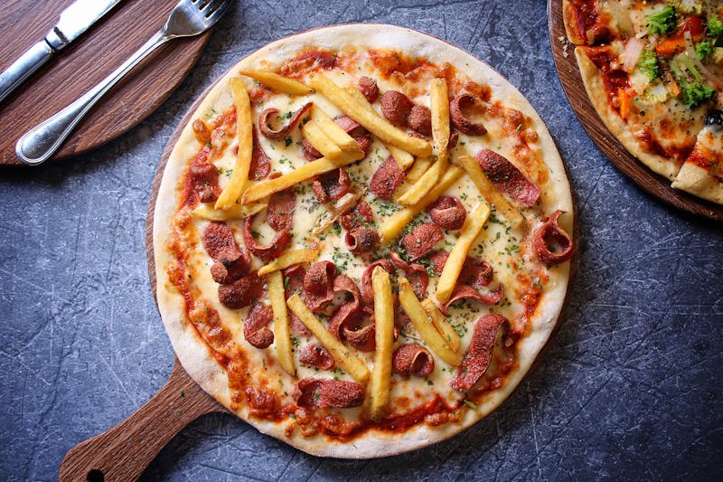 BBQ ranch pizza special with chicken and ranch drizzle