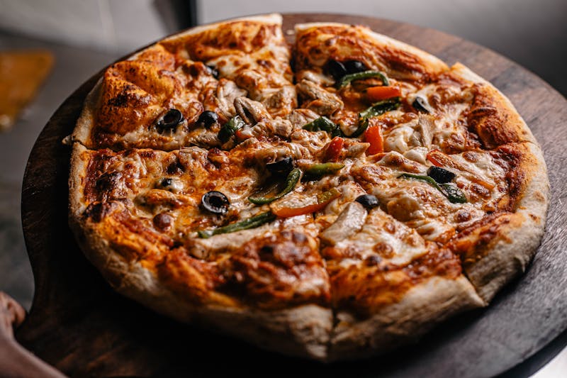 Garden fresh veggie pizza on herb-infused crust at Pizza Ranch